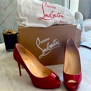 Never worn. Very Prive red patent leather pumps.